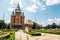 Photo of Victory Square with the Orthodox Cathedral, Timisoara is a long square with green park surrounded by national opera on one side and the metropolitan cathedral on the other.