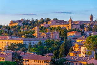 Aerial panoramic cityscape of Rome, Italy, Europe. Roma is the capital of Italy. Cityscape of Rome in summer. Rome roofs view with ancient architecture in Italy. 