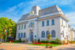 Photo of the facade of the Administrative Palace of Craiova (today Dolj Prefecture and County Council), an imposing historical monument located on the territory of Craiova, Romania.