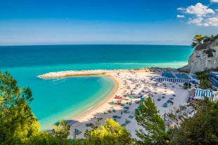 photo of majestic sunrise in Numana public beach. Picturesque summer seascape of Adriatic Sea. Colorful outdoor scene of Italy, Europe.