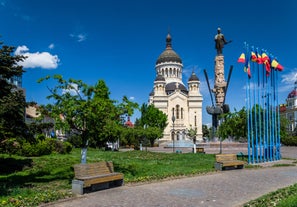 Antique building view in Old Town Bucharest city - capital of Romania and Dambrovita river. Bucharest, Romania, Europe.