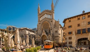 Photo of the famous orange tram runs from Soller to Port de Soller, Mallorca, Spain.