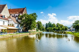 Photo of Lednice Chateau with beautiful gardens and parks on a sunny summer day, Czech Republic.