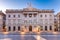 Photo of Casa de la Ciutat, City Hall of Barcelona on the Placa de Sant Jaume in The Gothic Quarter of Barcelona during morning blue hour, Spain.