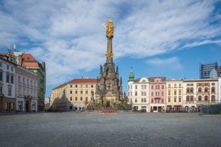 Photo of Lednice Chateau with beautiful gardens and parks on a sunny summer day, Czech Republic.