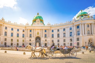 Panoramic view of historic Zurich city center with famous Fraumunster, Grossmunster and St. Peter and river Limmat at Lake Zurich on a sunny day with clouds in summer, Canton of Zurich, Switzerland