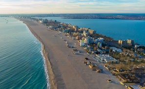 Photo of aerial view of beautiful beach in Mamaia, Romania.