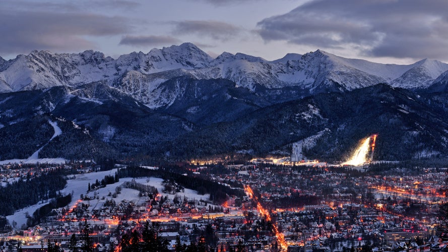 photo of panorama of the city of Zakopane at night, Poland.