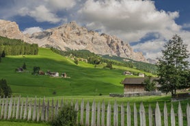 photo of Autumn morning panoramic shot on Stern-La Villa from San Cassiano, Piz la Ila, Gruppo Sella, Sassongher, Piza de Gherdenacia, Peitlerkofel in Italy.