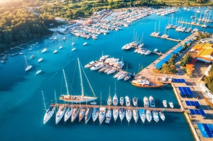 Photo of Ika village waterfront in Opatija riviera, turquoise sea and blue sky, Kvarner, Croatia.