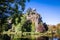 photo of Sibyl temple and lake in Buttes-Chaumont Park, Paris, France.