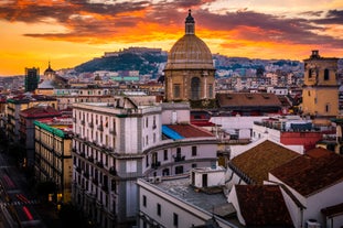 Photo of panoramic view of the ancient town of Matera (Sassi di Matera), European Capital of Culture 2019, in beautiful golden morning light with blue sky and clouds, Basilicata, southern Italy.