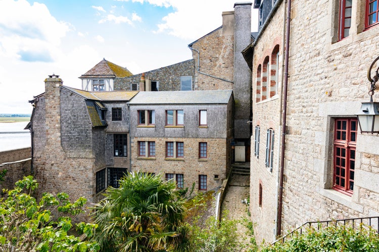 Photo of constructions in the area of cathedral Le Mont Saint-Michel in Normandy, France.