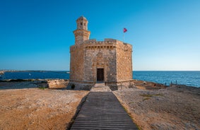 Photo of Cala Macarelleta in Ciutadella Menorca at turquoise Balearic Islands, Spain.