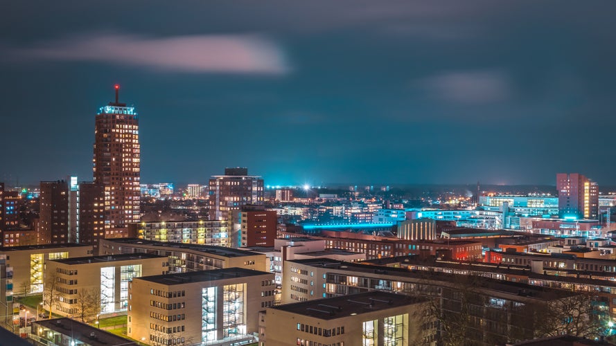 Panoramic picture at night of the skyline from Enschede, Holland, The Netherlands.