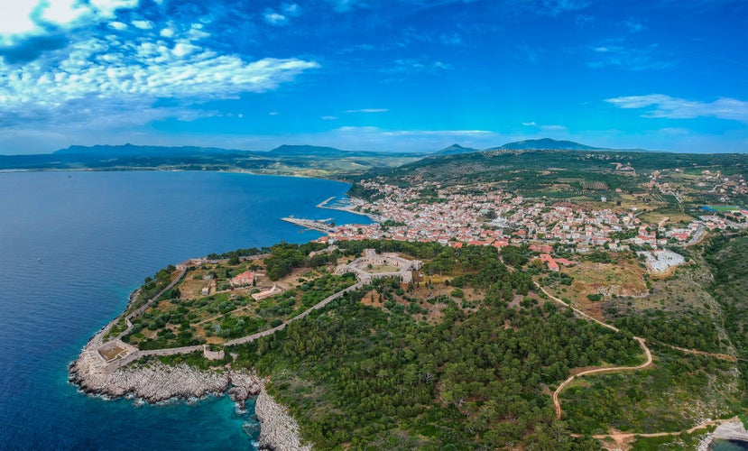 Photo of Aerial veiw of Pylos city and the castle. It is one of the best preserved castles in Greece. New Navarino or Niokastro, located near the entrance of the port of Pylos. Messenia, Greece, Europe.