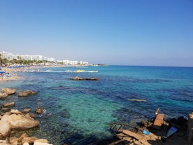 Photo of panoramic aerial view of Kalamis beach and bay in the city of Protaras, Cyprus.