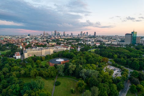 Warsaw at sunset. The capital of Poland is illuminated by a beautiful orange sun.
