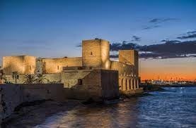 photo of view of Castello di Trani at night , Trani, Italy.