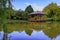 Photo of Japanese style park with a pagoda and a pond in Yamaguchi Park in Pamplona, Navarra, Spain town famous for the running of the bulls.