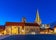 Sunset view of Nidaros cathedral from courtyard of archbishop's palace in Trondheim, Norway