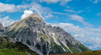 photo of Alpine aerial summer view with the famous Nordkette mountains seen from Serle's cable car station, Mieders, Stubaital valley, Innsbruck, Austria.