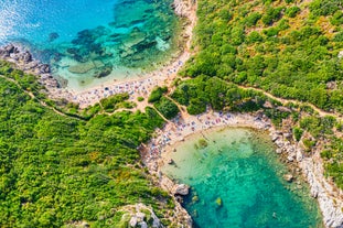 Photo of panoramic aerial view of Palaiokastritsa, Corfu, Greece.