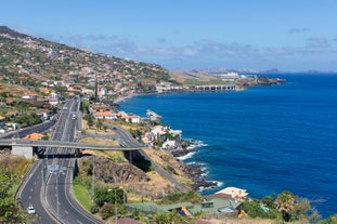 Photo of panoramic aerial view of idyllic coastal village of Porto da Cruz Madeira island, Portugal.