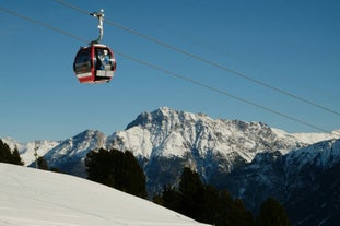 Photo of  beautiful Scuol town in Swiss Alps and Inn river, Switzerland.