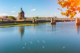 Photo of Toulouse and Garonne river aerial panoramic view, France.