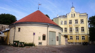 Scenic summer view of the Old Town and sea port harbor in Tallinn, Estonia.