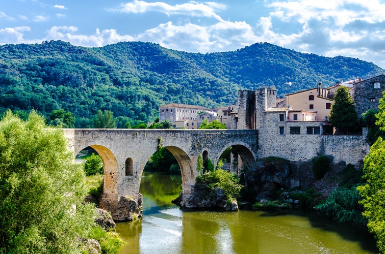 Photo of famous medieval bridge over the river Fluvia in the medieval village de Besalú, Girona, Catalonia, Spain.