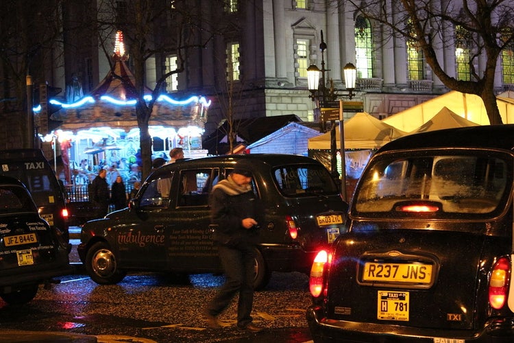 1280px-Taxis,_Belfast,_November_2012.jpg