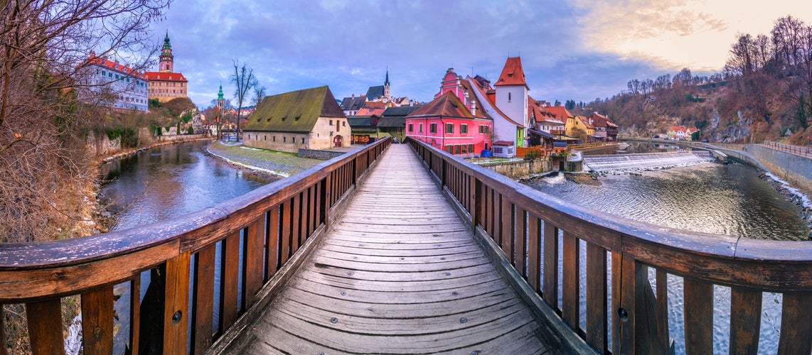 Panoramic view of Cesky Krumlov with St Vitus church in the middle of historical city centre. Cesky Krumlov, Southern Bohemia, Czech Republic.