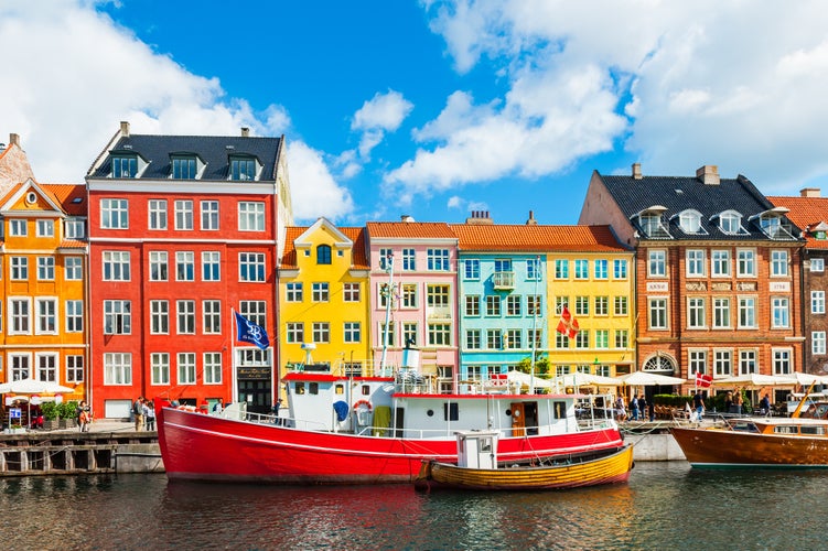 Famous Nyhavn pier with colorful buildings and boats in Copenhagen, Denmark.jpg