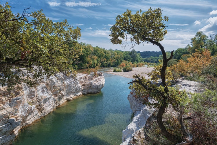 Photo of At the foot of the hill on which La Roque sur Ceze in France lies, swirl spectacular waterfalls and rapids of the Cascades du Sautadet.