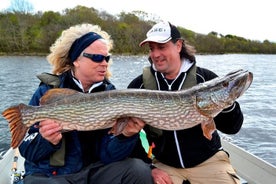 Pike fishing by boat.Lough Corrib,Connemara.English/French speaking Ghillie