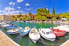 photo of a beautiful panoramic view of Kastel Luksic harbor and landmarks summer view, Split region of Dalmatia, Croatia.