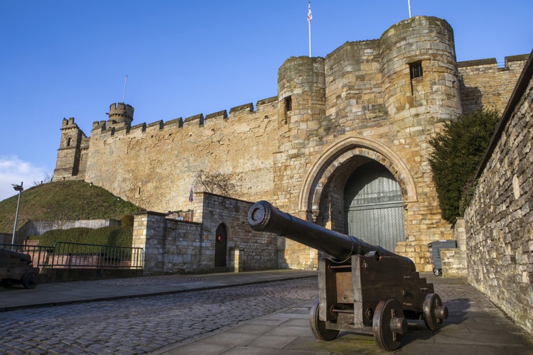 Photo of  view of the historic Lincoln Castle in Lincoln, UK. The Castle was constructed by William the Conqueror in the 11th Century.