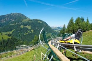 photo of beautiful alpine summer view with a church at Waidring, Tyrol, Austria.