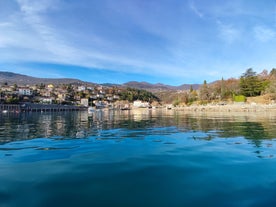 Photo of Ika village waterfront in Opatija riviera, turquoise sea and blue sky, Kvarner, Croatia.