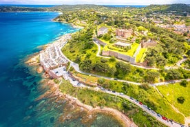 Photo of beautiful aerial view of Saint-Tropez, France with seascape and blue sky.