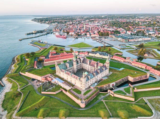 photo of an aerial view of Kronborg castle with ramparts, ravelin guarding the entrance to the Baltic Sea and the Oresund in Helsingor Denmark.