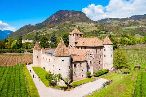 photo of view of Maretsch Castle or Castel Mareccio is a medieval fort in the historic center of Bolzano in South Tyrol, northern Italy.