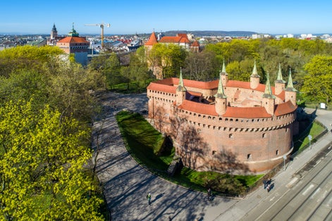 Barbican (Barbakan) in Cracow, Poland. The best preserved medieval barbican in Europe and Planty park surrounding the old city. Aerial view