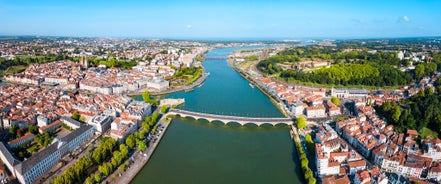 Photo of cityscape of French border town Hendaye, as seen from Spanish Hondarribia, with Famous Rhune Mount at Background, France.