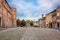 Cesena, Emilia-Romagna, Italy: landscape of the ancient square Piazza del Popolo with the fortified palace Rocchetta di Piazza and the fountain Fontana del Masini in the old town of the city