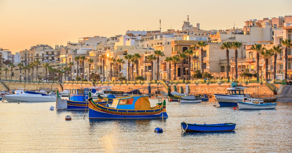 Marine with boats in fishing village Marsascala at sunrise