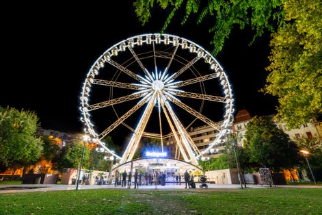 Photo of Budapest Eye (ferris wheel) at Erzsebet Square. Luminous Ferris wheel in night city, Budapest, Hungary.