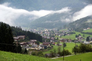 photo of beautiful alpine summer view with a church at Waidring, Tyrol, Austria.